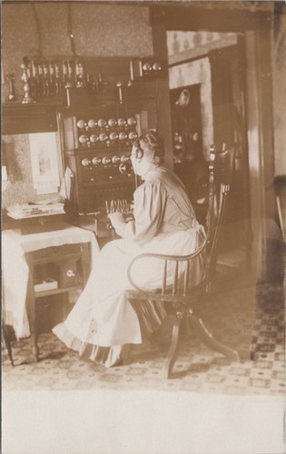 Telephone switchboard operator - telephone,